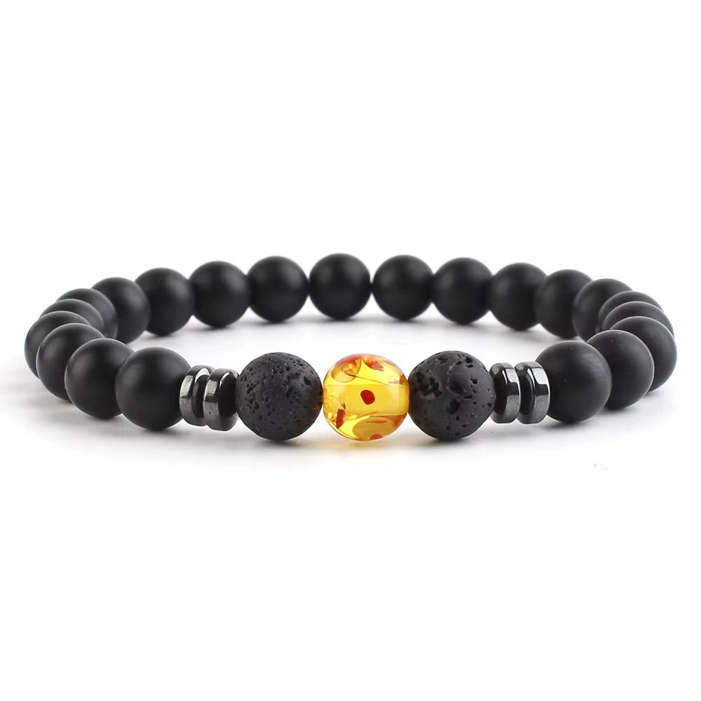 Bracelet - perle de lave noire et perle ambrée (Ref B024)