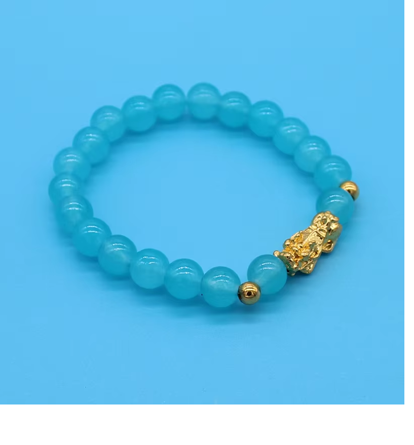 Bracelet - perle bleu ciel et dragon doré (Ref B003)